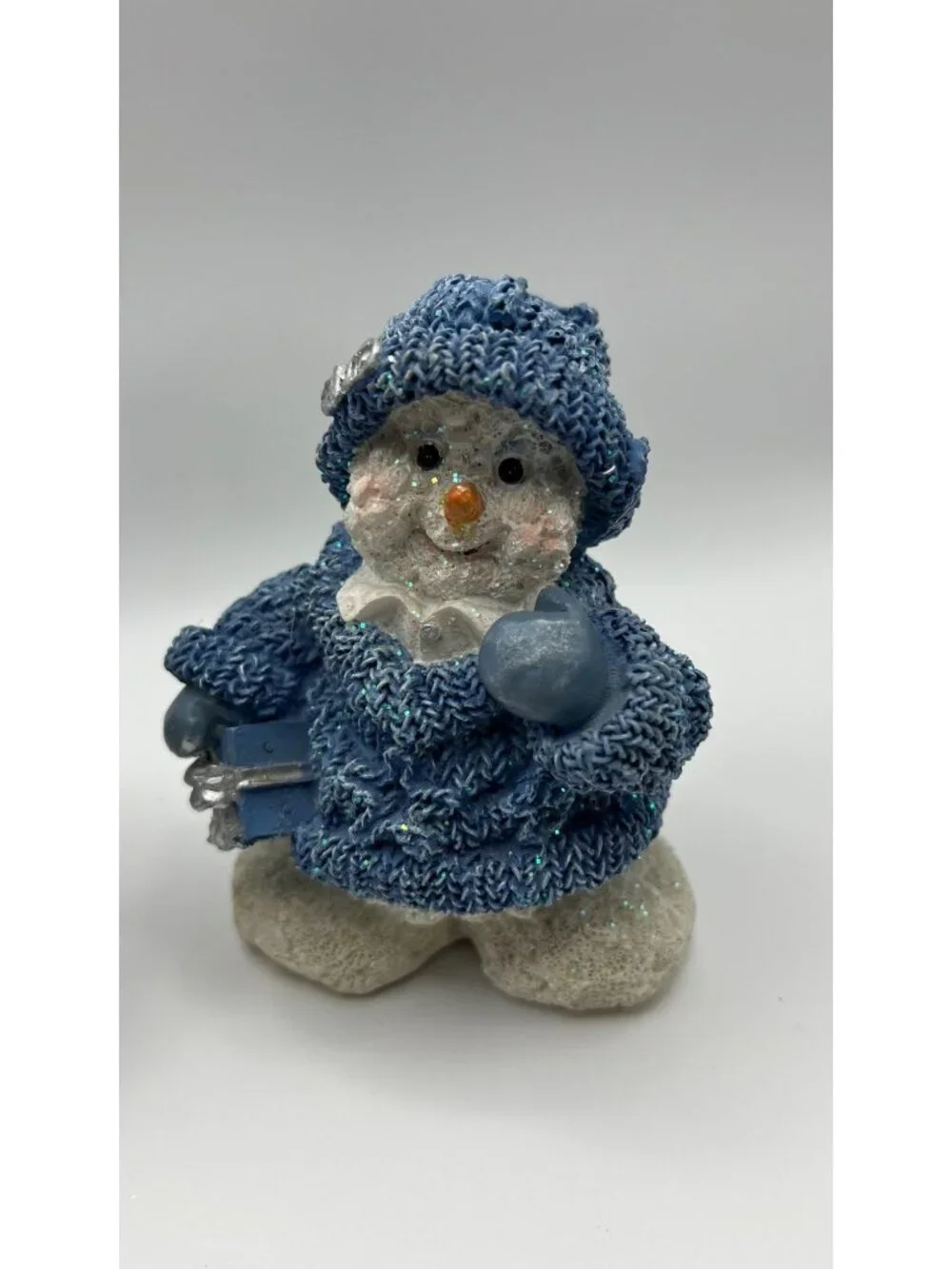 Set Of 2 Glittered Blue Snowman Figurines With Knitted Look Holding Birdhouse &